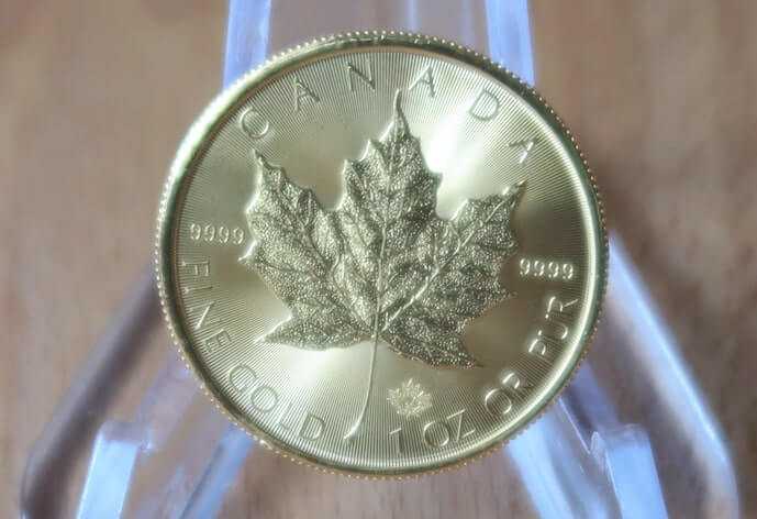A 2020 gold maple leaf coin from the Royal Canadian Mint.